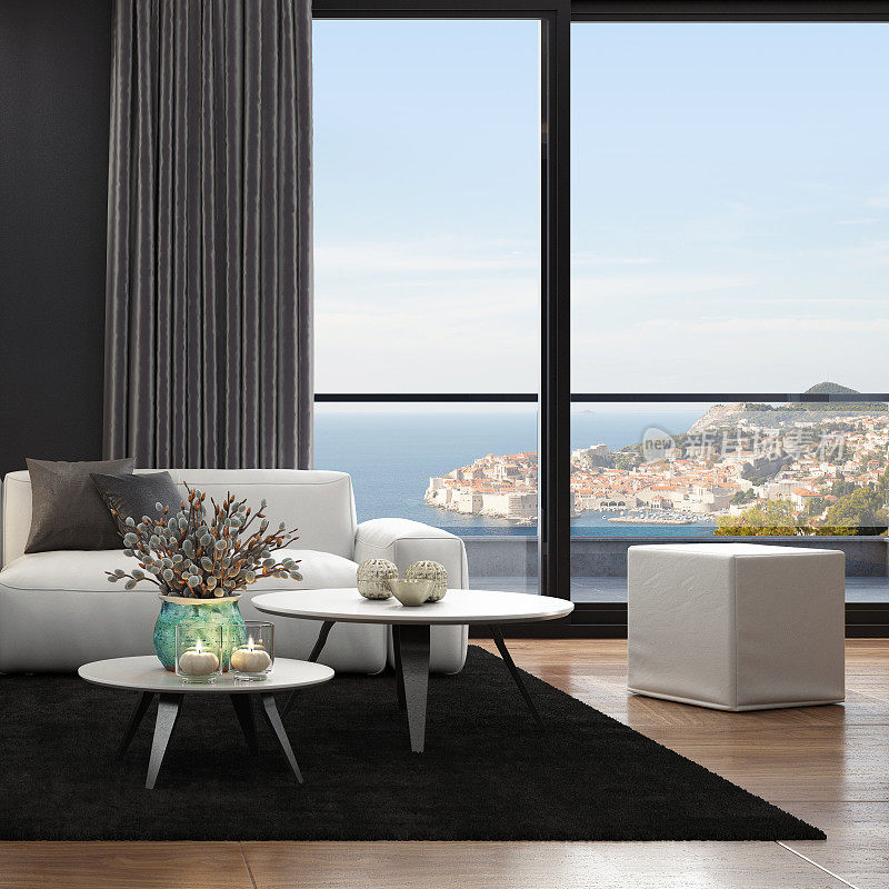 白色真皮沙发在豪华深色室内客厅与现代极简主义意大利风格的开放式空间厨房