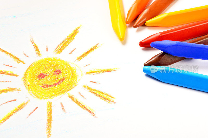 儿童绘画，用彩色蜡笔画太阳