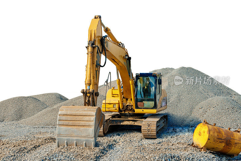 挖掘机在一个建筑工地的碎石堆中被隔离