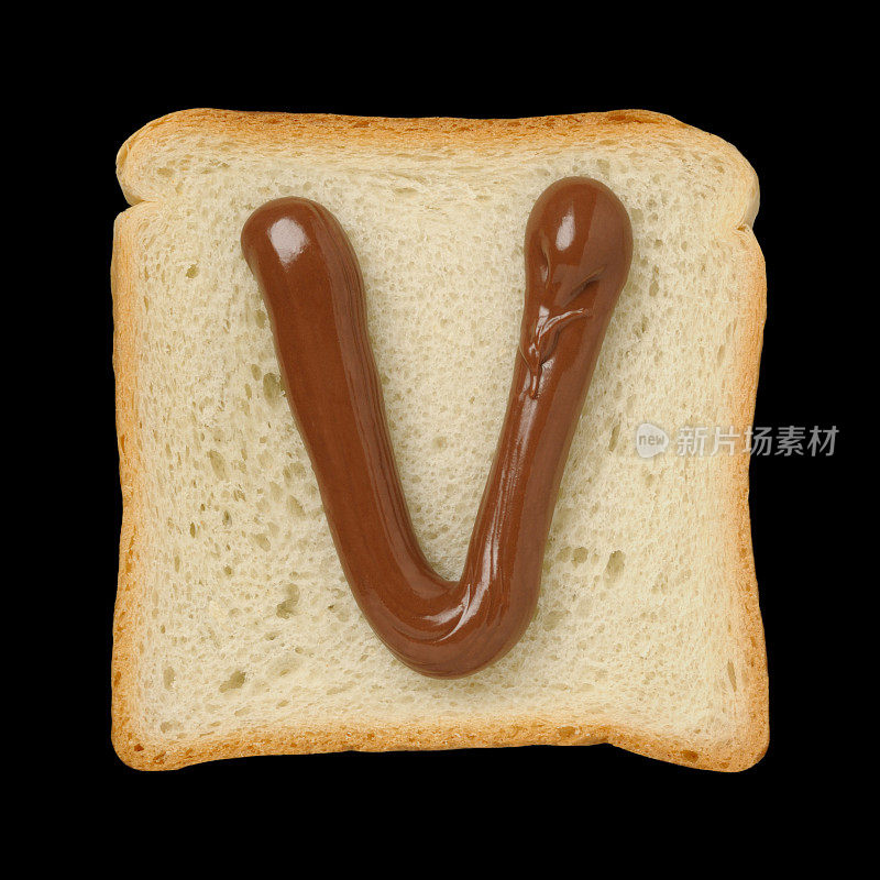 巧克力字母V在锡面包片，黑色背景