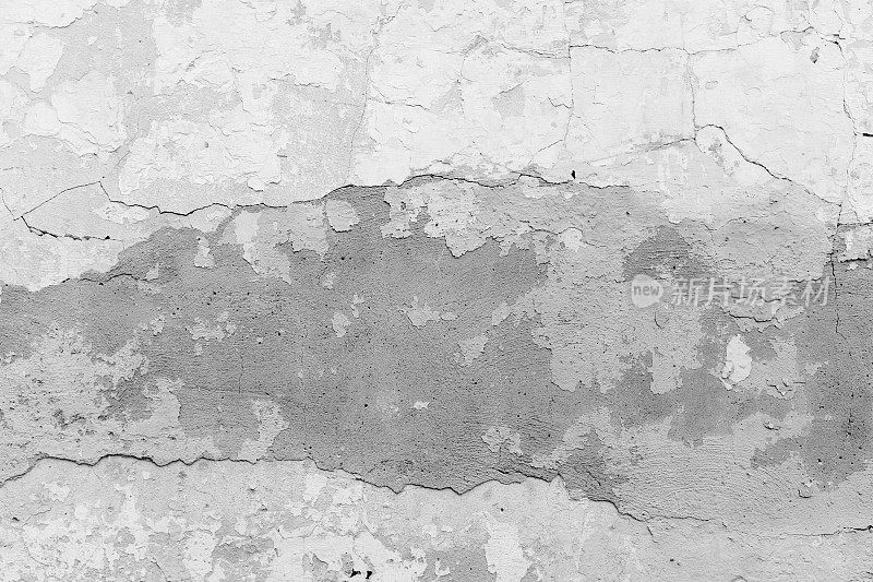 剥落的旧灰泥墙。
