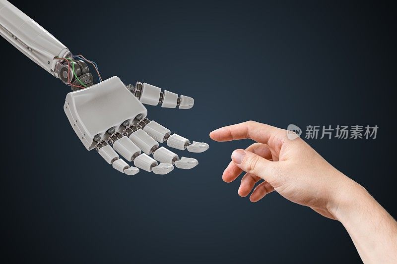 机器手和人的手正在接触。人工智能与合作概念。
