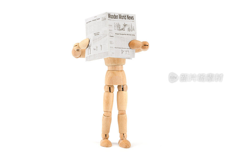 木制人体模型在看报纸，什么都听不见