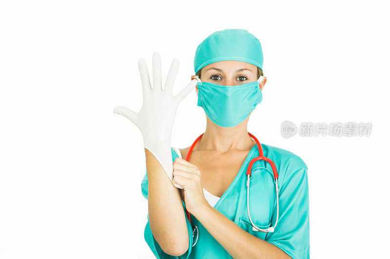 成功的女医生戴上乳胶手套