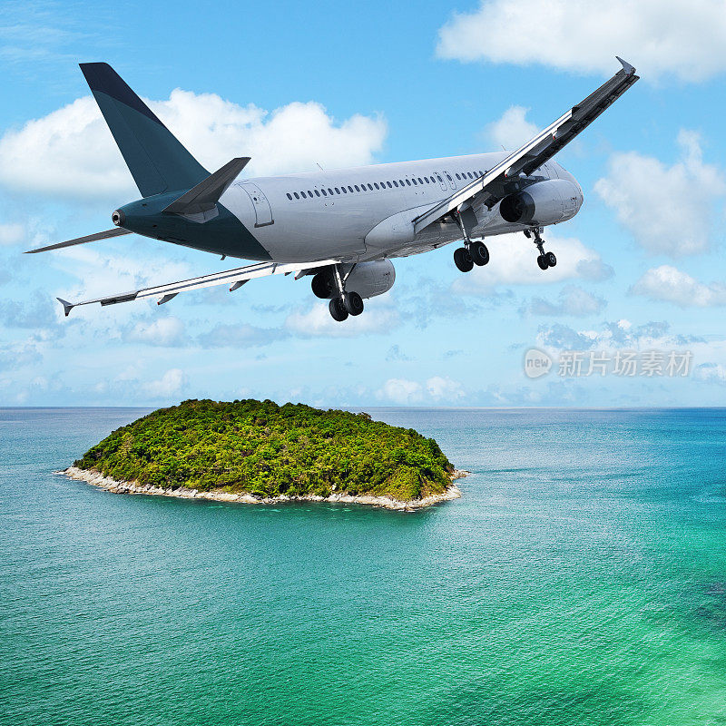 喷气式飞机飞越热带岛屿