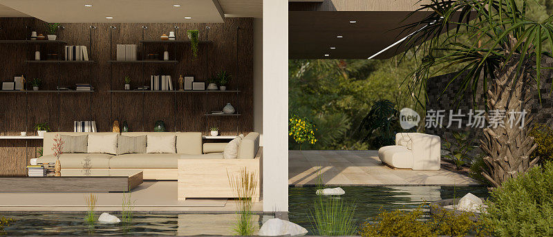 一个现代和豪华的家庭庭院休息室与休闲区，热带花园，和小池塘