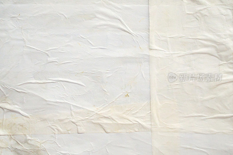 白色皱巴巴和皱巴巴的胶合纸海报纹理背景