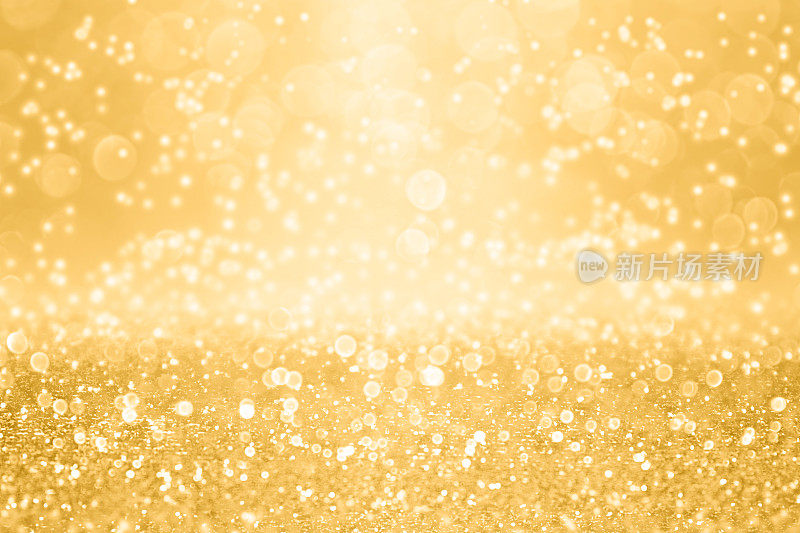 优雅的金色闪光闪耀的背景为结婚纪念日，生日或圣诞节