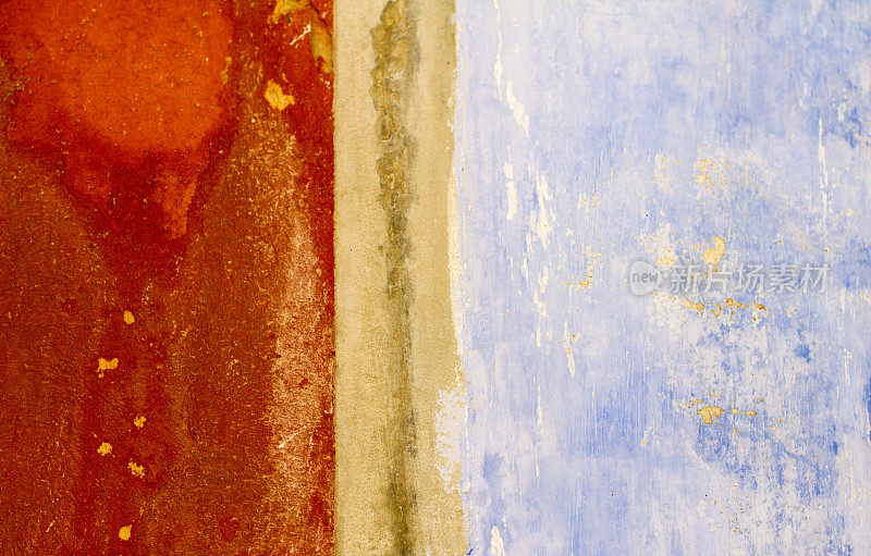 老西西里墙背景纹理:斑驳的橙色和蓝色