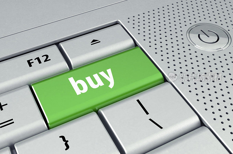 绿色电脑键与购买字。