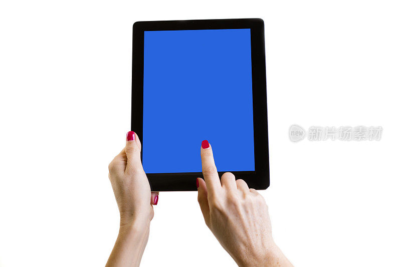 女子用平板电脑拍照、上网。技术。