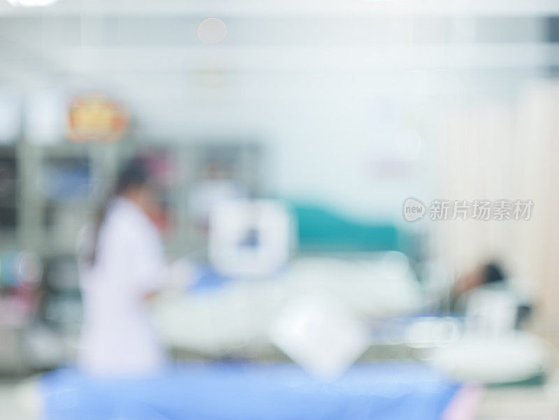 模糊的医院背景抽象模糊医生和护士忙于处理许多病人在急诊室或在病房为背景