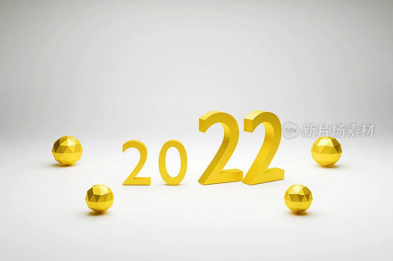 白色背景上金色球体上的2022年新年