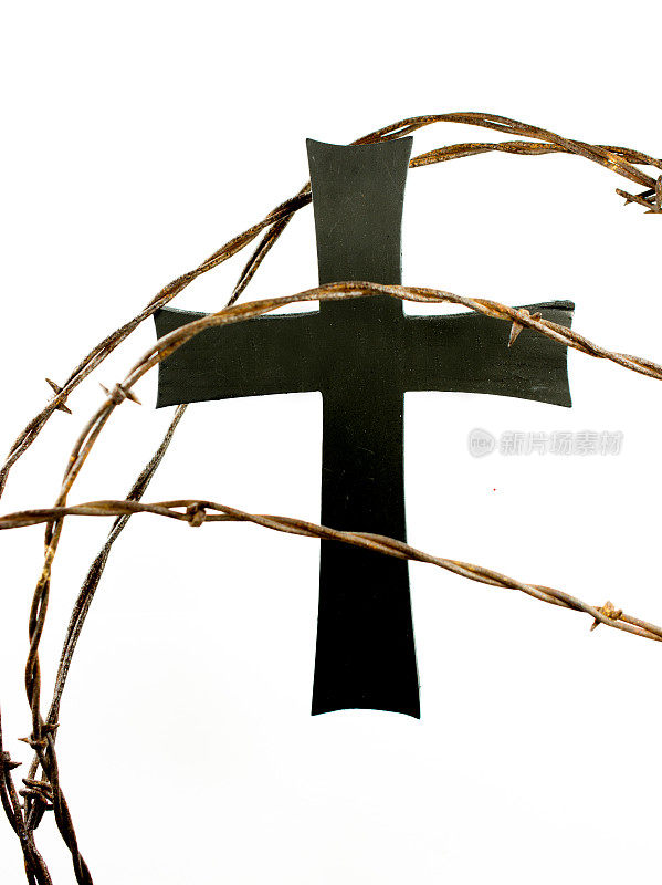 十字和带刺铁丝网