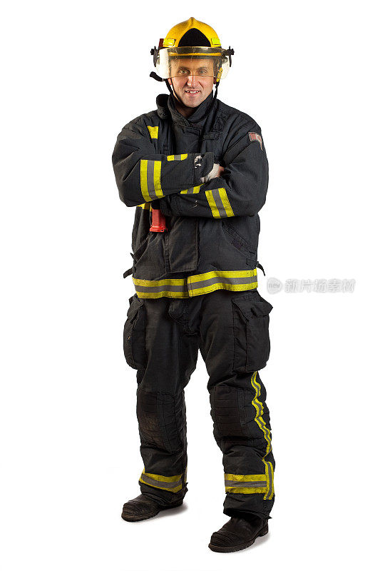 一名消防队员站在白色背景上的摄影。