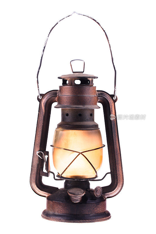 燃亮的煤气灯，孤立在白色背景上。一盏古董灯。潮人配件。野营灯。室内装饰。