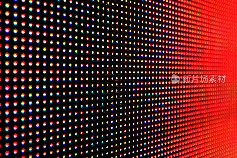 现代LED标识的细节，以红色、白色和粉色显示单个像素