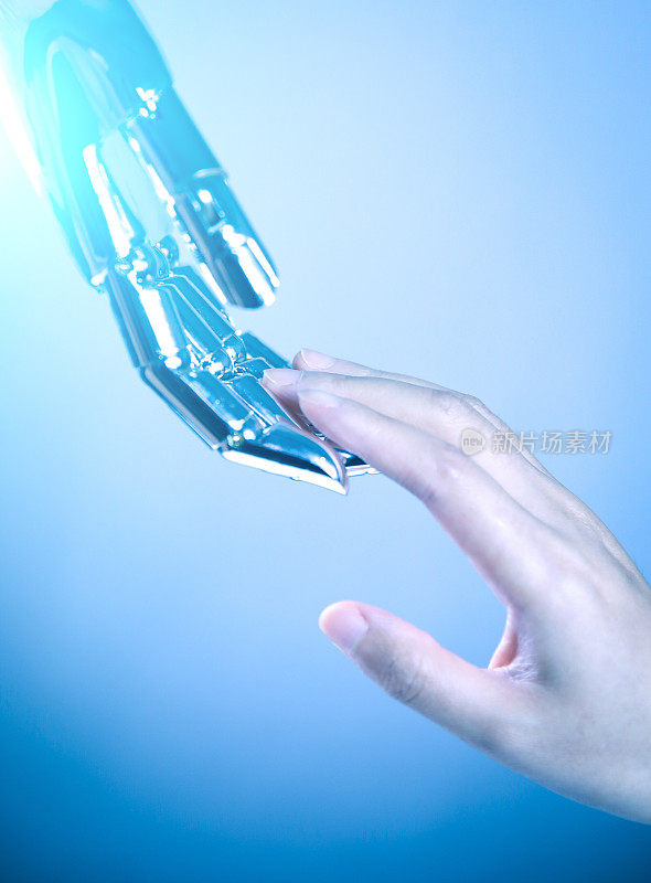 人类和机器人的手触摸