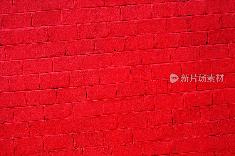 明亮的红色混凝土墙背景