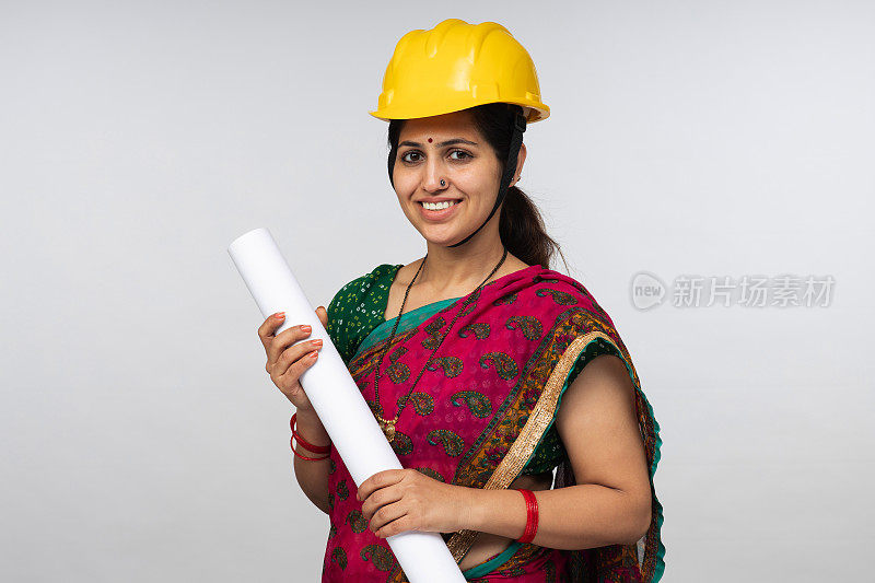 女工程师在硬帽股票照片
