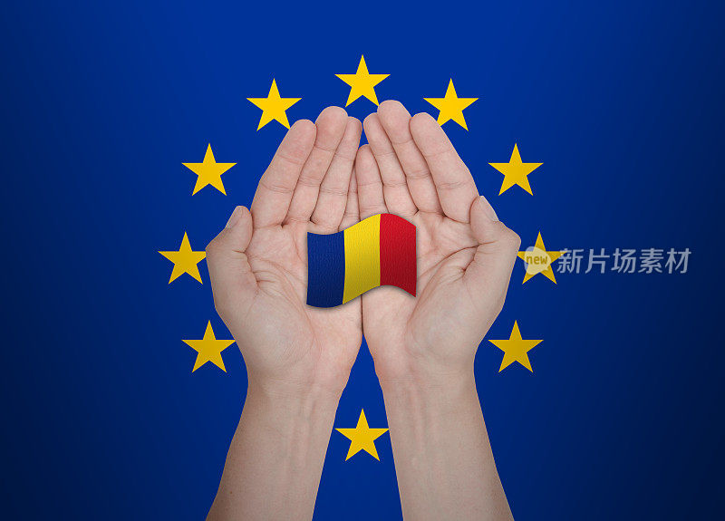 欧盟手保护欧盟成员国罗马尼亚的旗帜