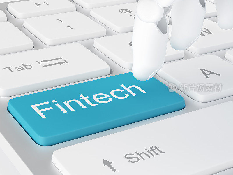 白色电脑键盘上的Fintech机器人手