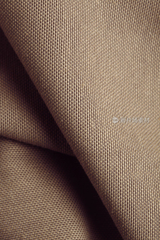 深棕色纺织品作为背景抽象