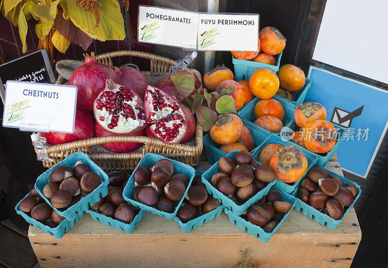季节性户外展示石榴、栗子和柿子