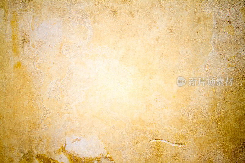 旧西西里墙背景:淡黄色和斑驳