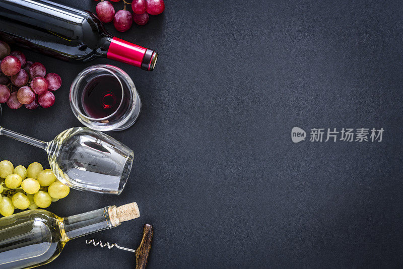 葡萄酒背景:红色，rosé和白葡萄酒在黑色背景与拷贝空间
