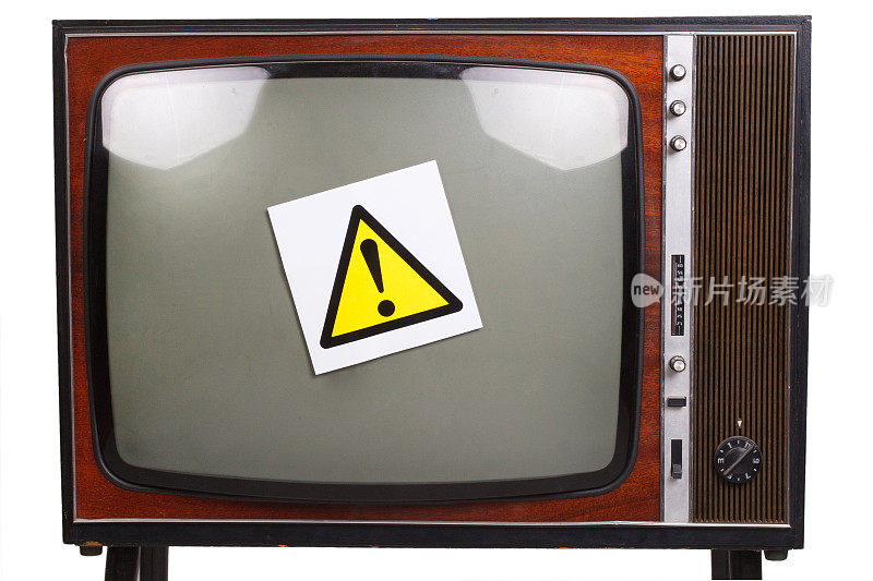 复古复古的黑白电视与黄色注意标志