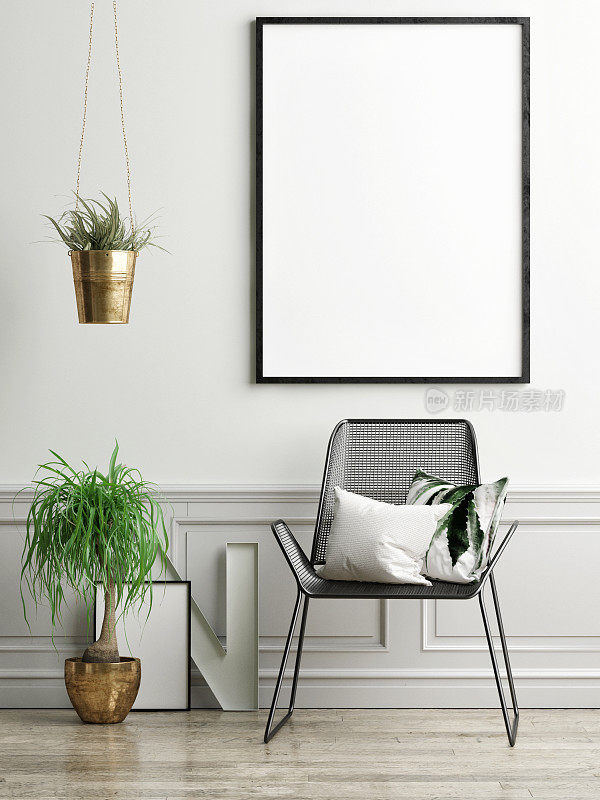 椅子，植物和模拟海报在浅绿色的墙上