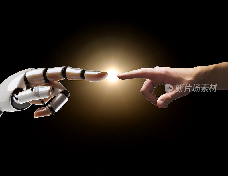 一只机械手指向一只人手。人工智能概念。