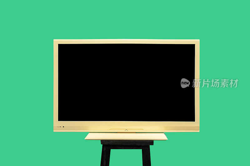 平板电视，液晶电视与黑色屏幕隔离在绿色背景，剪辑路径，正面视图，工作室拍摄