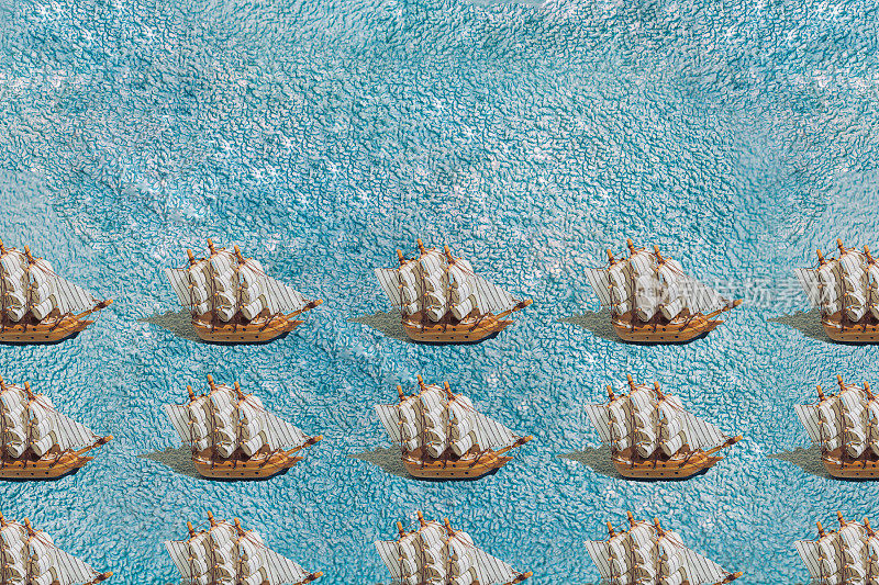 一艘蓝色毛巾上的木制帆船。模式。