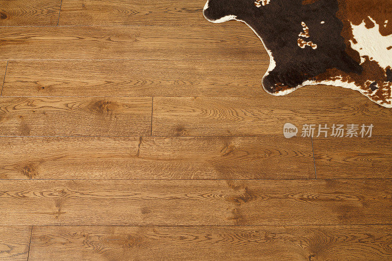 橡木纹理拼花木质背景橡木地板与皮革地板覆盖。