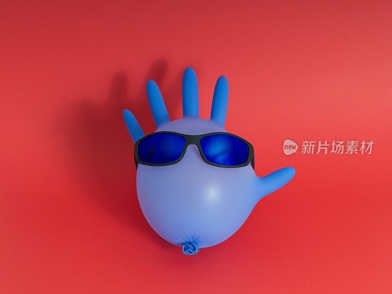 幽默的空气充满了蓝色乳胶手套，戴着以红色背景为中心的太阳镜