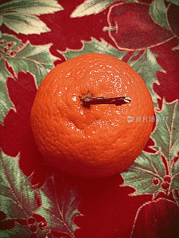 花桌布上的橘子、柑桔(小柑橘)特写