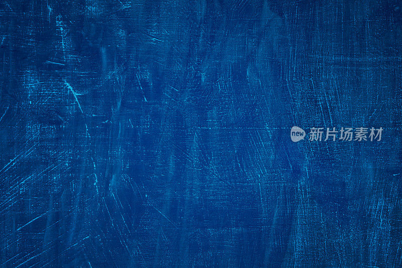 装饰grunge海军蓝，暗灰泥水泥墙背景与文本复制空间