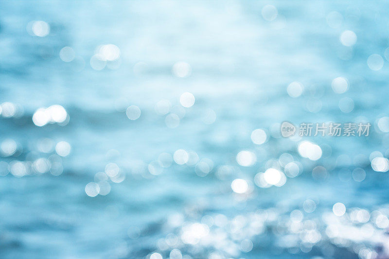 模糊美丽的闪闪发光的热带蓝色海滩