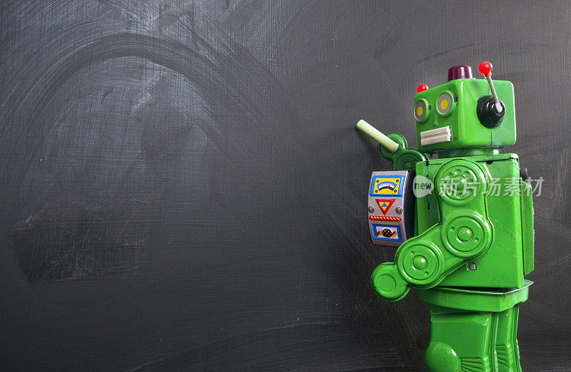 绿色的机器人老师在黑板上