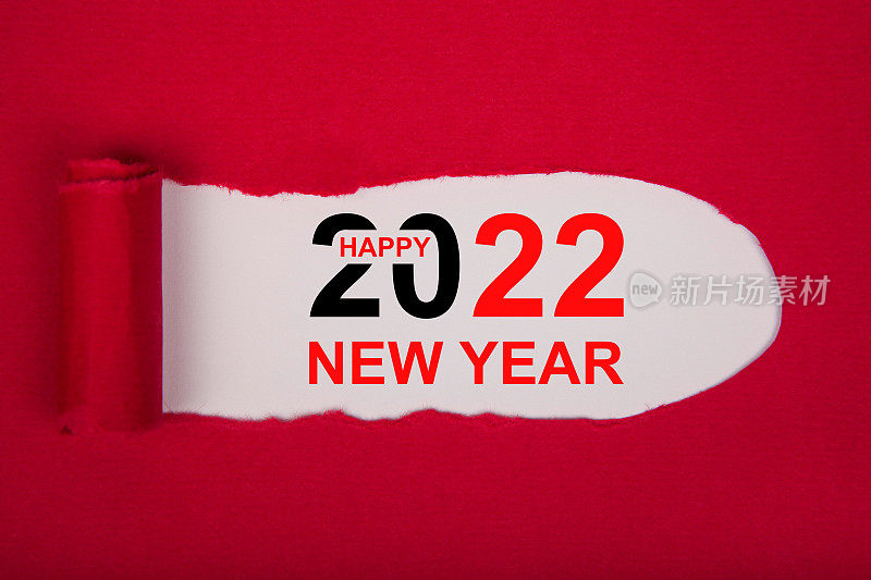 撕纸与快乐的新年2022在白色背景