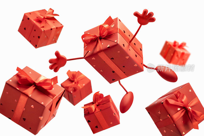 礼物在飞扬的盒子里，用红礼纸裹着蝴蝶结，孤立无间。节日和贺卡的概念。