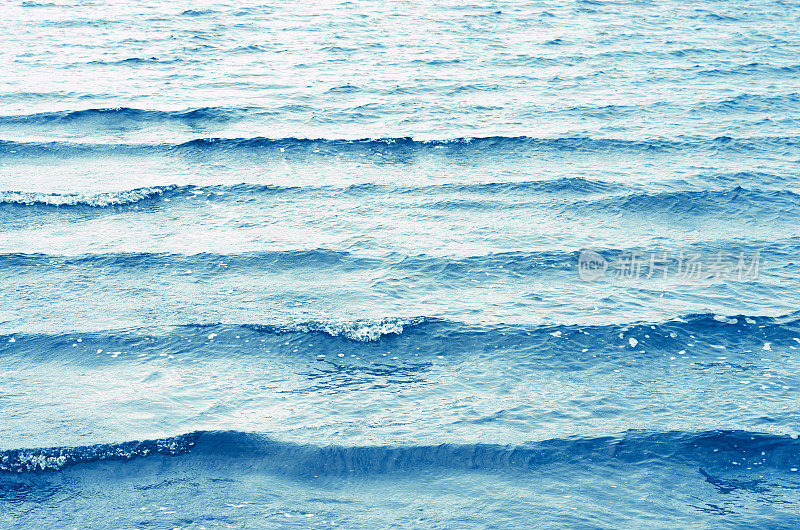 蓝色的水波纹波表面背景。