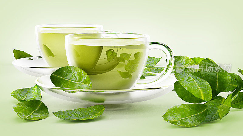 杯子上有绿茶和孤立的茶叶白色
