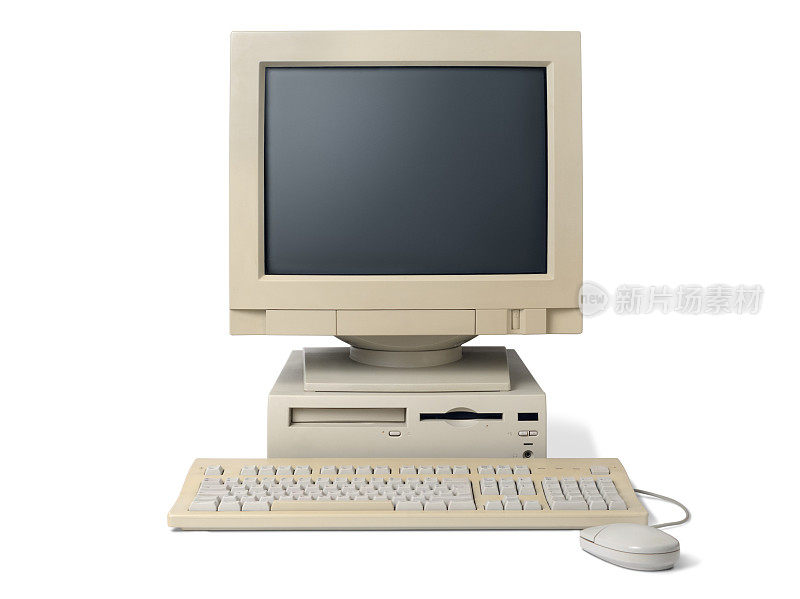 老式的白色台式机，有键盘和鼠标