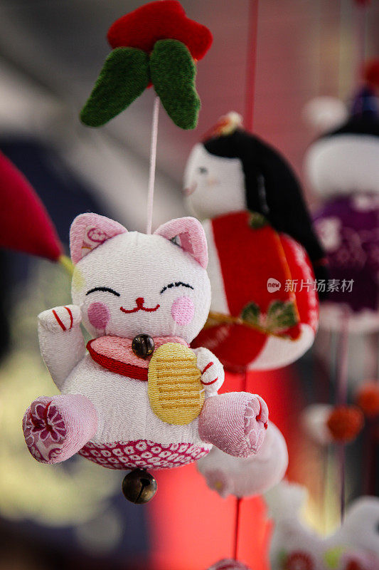 日本玩具猫雕像移动市场