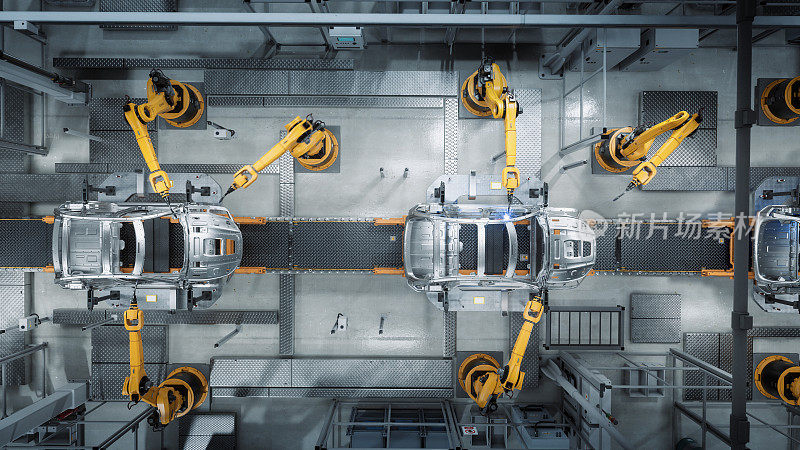 空中汽车工厂3D概念:自动化机器人手臂装配线制造先进的高科技绿色能源电动汽车。建筑，建筑，焊接工业生产输送机