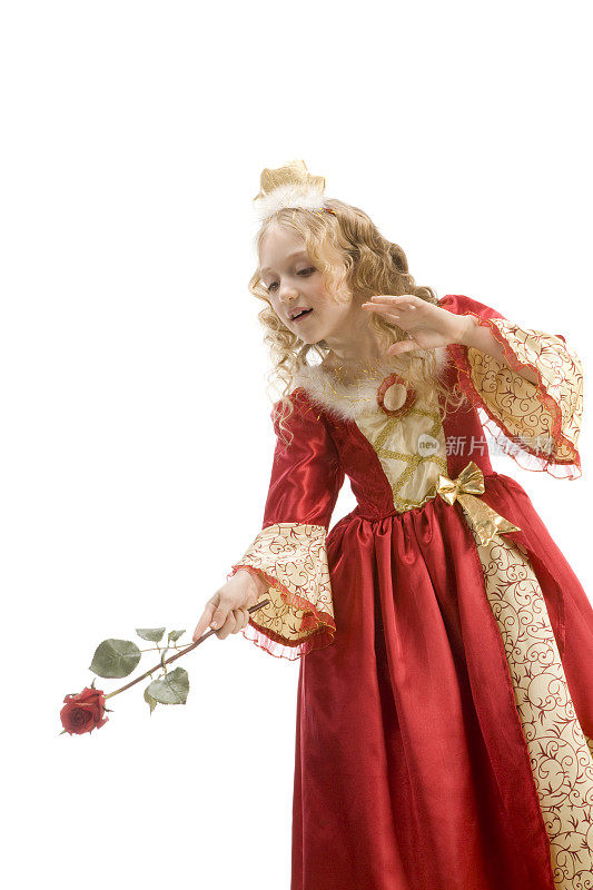 美丽的小公主用红玫瑰像一根魔杖。