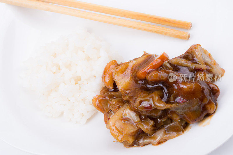 中国的一种食物，用白米饭和两根棍子做成